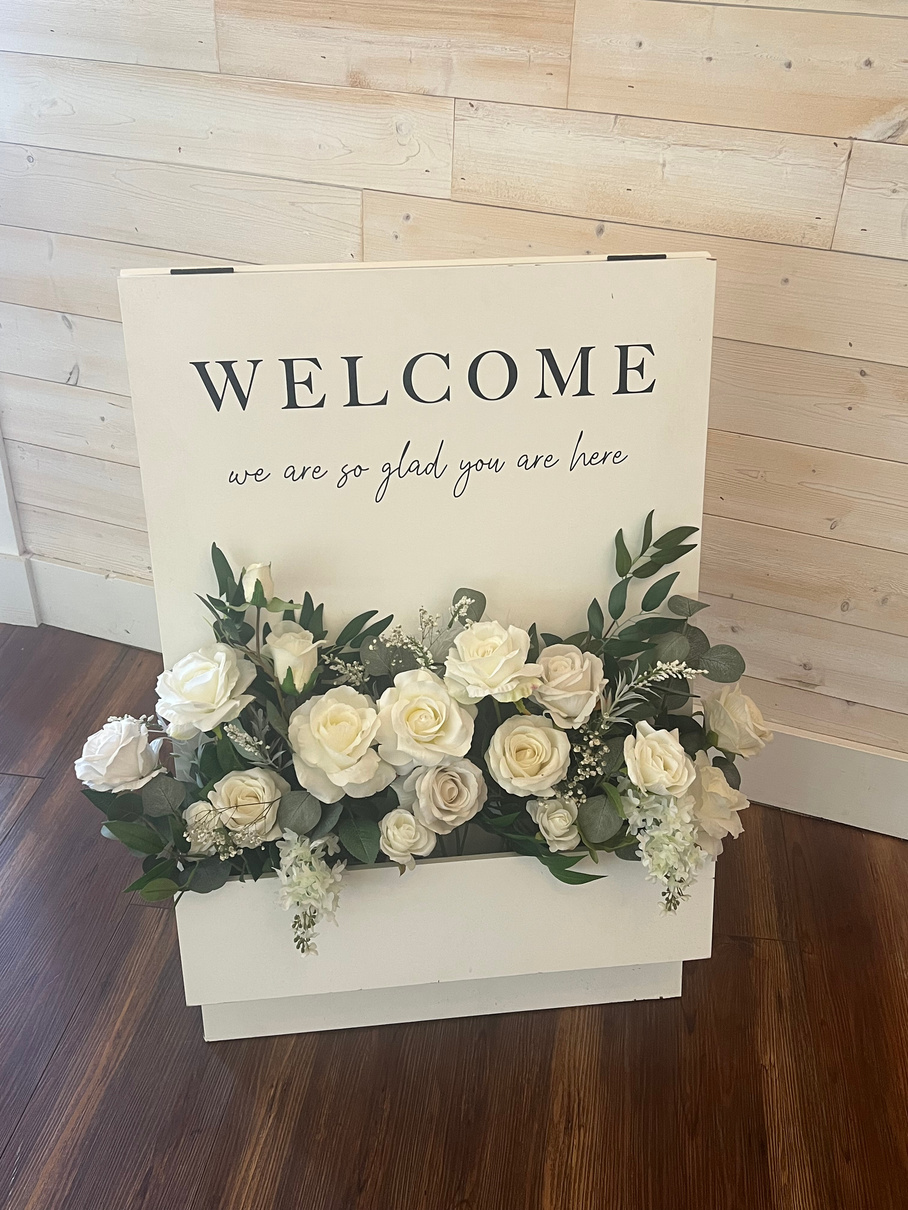 Gold hanging welcome sign
